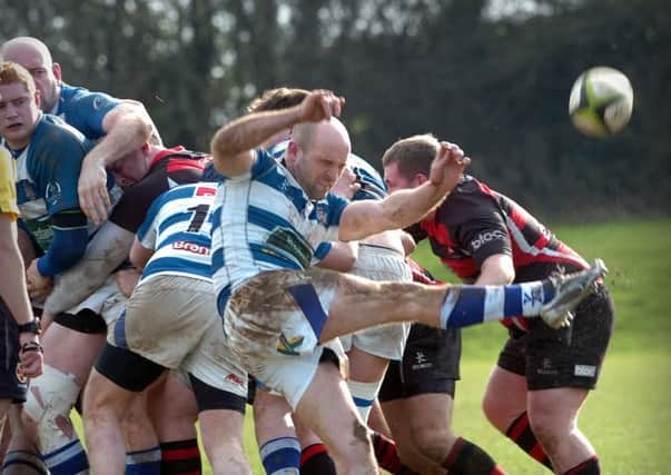 KICK... Dungannon kick the ball forward during Saturday's Ulster League clash with Rainey Old Boys.INMM1114-373SR