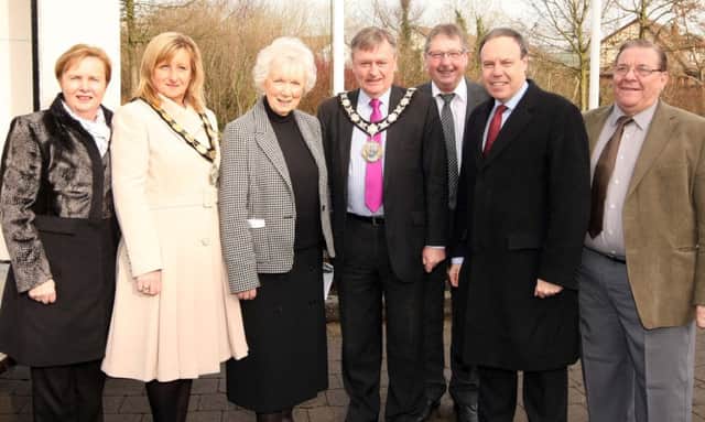 NBC chief executive Jacqui Dixon, Deputy Mayor Dineen Walker, Lord Lieutenant for Co Antrim Mrs Joan Christie, Mayor Fraser Agnew, Sammy Wilson MP, Nigel Dodds MP and Billy Snoddy, Chairman of Carnmoney and Glengormley RBL, at the Commonwealth Day flag raising event at Mossley Mill. INNT 11-047-FP