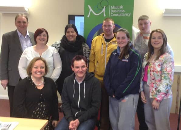 Guest speaker Gerry Faloona, Victoria Moore from the Dunanney Centre, Vanessa Postle, NBC Economic Development Officer, and Tamsin Evans from Mallusk Enterprise Park with some of the young people who participated in the Meet Your Future workshop.