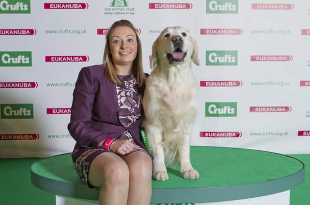 Emma Archibald f with her Retriever (Golden), Blue, the best of breed winner  
This image is copyright onEdition 2014©.