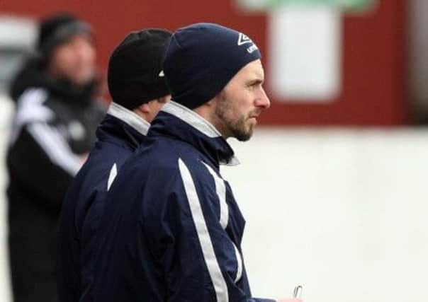 Ballyclare coach Stuart McClean in the technical area against Armagh City.