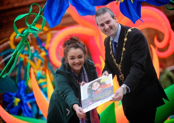 The Mayor of Derry, Councillor Martin Reilly, pictured with Eimear Hone, Events Department, Derry City Council at the launch of the St Patrick's Day celebrations. DER1014SL015