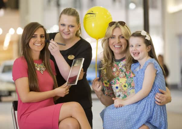 Fairhill Shopping Centre in Ballymena is encouraging shoppers to gather their nearest and dearest together for its free Friends & Family event on Tuesday, April 1 from 6-9pm.  Pictured L-R are: Danielle McCaughern of Fairhill Shopping Centre, Heather McDonald of Boots with Tina Cushnie and her daughter Kristen (age 6).