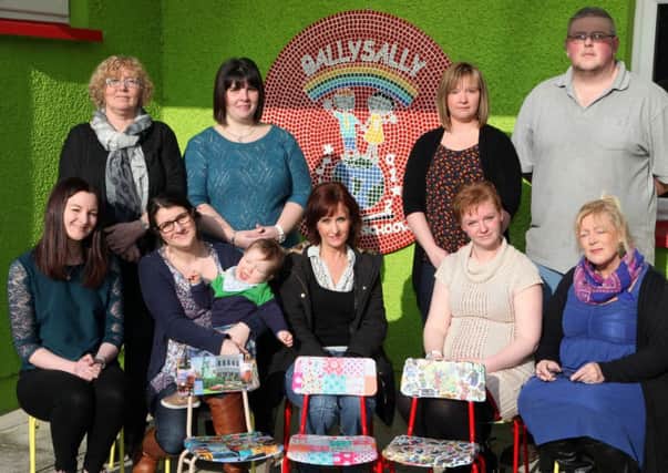 Parents pictured with some of the creative artwork designs completed at Ballysally Primary School. Included are, Samantha Linton, seated left schools co-ordinator, and Linda Lewis, seated right art co-ordinator.