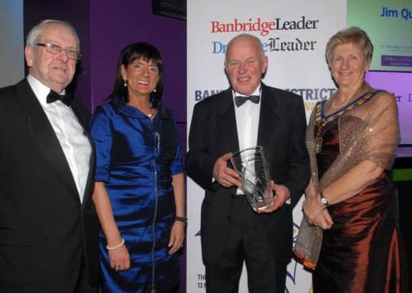 Jim Quail winner of the award for Lifetime Achievement at the Banbridge & District Business Awards along with Council chairman Olive Mercer, Jean Long, Johnston Press and Jim Bell, William Bell & Co.   INBL1214-BUSAWARD45
