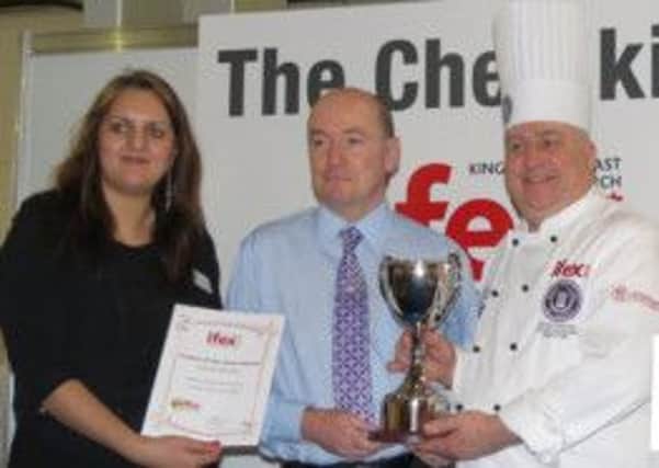 Broughshane-based Stephens Catering Equipment has been awarded the top accolade at IFEX 2014. Northern Irelands premier food, drink, retail and hospitality event,  for its Garland  Group Induction Griddle cooking technology. Pictured is Soraya Gadelrab, Event Director, IFEX with Ian Manson, Sales Director, Stephens Catering Equipment and Sean Owens, Salon Culinaire Director.