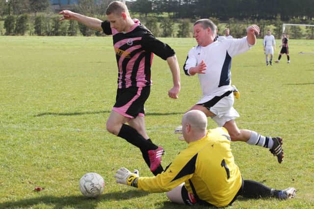 Action from Bertha's 10-1 win over FC Crusaders. PICTURE: Mark Jamieson