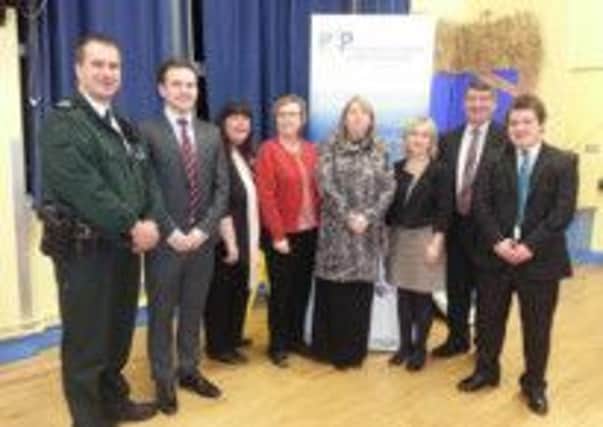 Sergeant Ernie Craig, Carrick PSNI; Councillor Andrew Wilson, PCSP chair; Brenda Leslie; Marjorie Hawkins; Sharon Maxwell; Briege Donaghy; Cllr Noel Williams and Neil Heron, PCSP manager at the meeting.  INCT 12-735-CON
