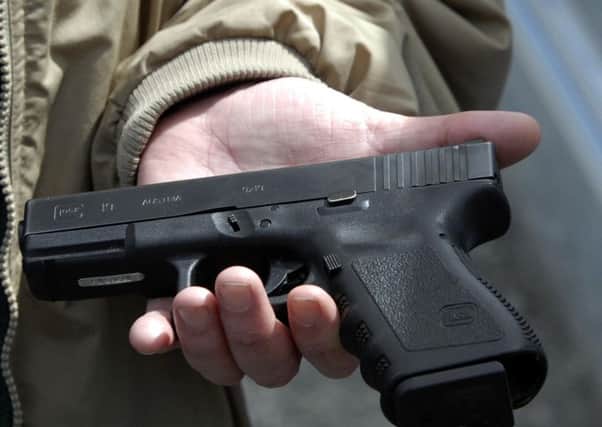 A Glock pistol. One was discharged accidentally in a PSNI station in January.