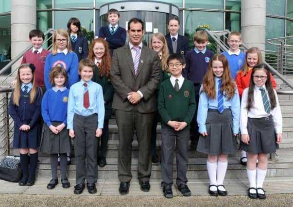 Councillor Luke Poots, Vice-Chair of the Council's Environmental Services Committee is pictured with the primary and post-primary entrants in the Lisburn heat of the 2014 Environmental Youth Speak competition held at Lagan Valley Island.
