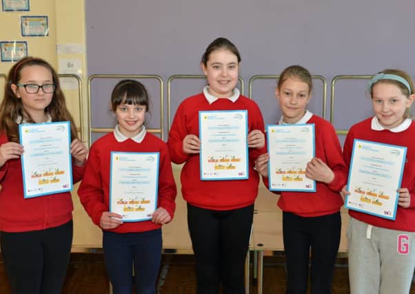 Cairncastle Primary School pupils,Molly Ringland,Rachel Taylor,Avianne Porter,Sonora Dunce and Eva McGeown proudly show off their certificates after participating in the 5 Star Disability Sports Challenge. INLT 12-002-PSB