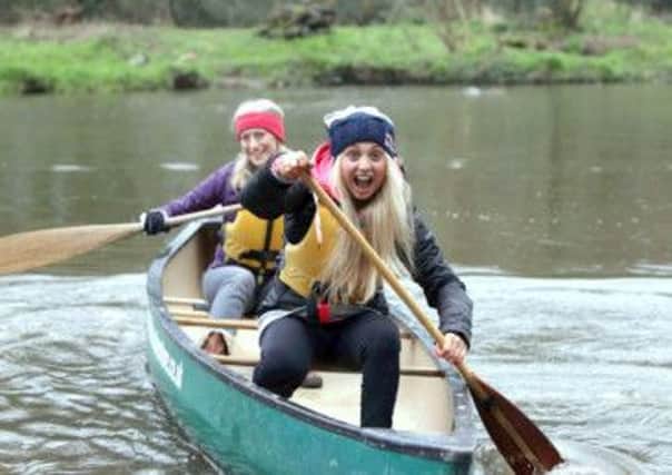 Adventure fun...2014 Winter Olympic Snowboarder Aimee Fuller (front) who lives in Northern Ireland, along with the Northern Ireland Tourist Boards Julie McLaughlin take to the water at Shaws Bridge, one of over 55 fun outdoor events taking place over Adventureland Weekend on April 5 and 6.  During the Northern Ireland Adventureland Weekend, which aims to highlight the large number of outdoor activities available to people here, a lower rate of either 50% off or £10pp will be offered. Booking is essential, for a full list of Adventureland activities and to book online go to www.discovernorthernireland.com/adventure