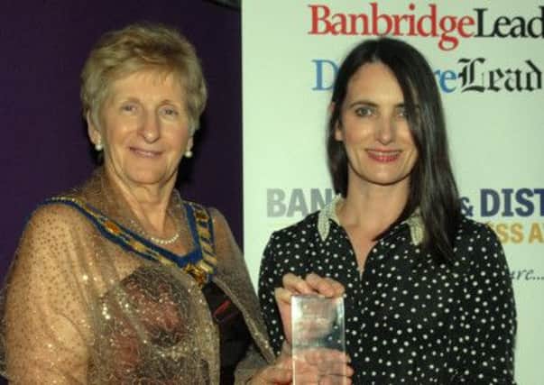 The Banbridge District Business Award for Excellence in Tourism was presented by Council chairman Olive Mercer and received by Una O'Neill, Golfkeel.  INBL1214-BUSAWARDS34