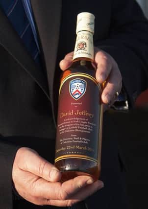 Coleraine Chairman Colin McKendry and Manager Oran Kearney present David Jeffrey with a commemorative bottle of Coleraine Whiskey on the occasion of his last visit to the showground as Linfield Manager.


The special label reads "Presented to David Jeffrey In Acknowledgement of his contribution to Irish League Football on the occasion of his last game as manager of Linfield Football Club at the Coleraine Showgrounds,  from The Directors, Staff & Players of Coleraine Football Club.  Saturday 22nd March 2014"