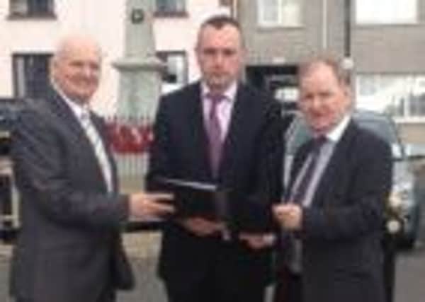 Rev William McCrea MP, Keith Buchanan DUP Candidate for Torrent, and Lord Morrow surveying the Electoral boundary changes for the District electoral area (DEA) of Torrent which now includes Stewartstown, Brigh and Ardtrea.