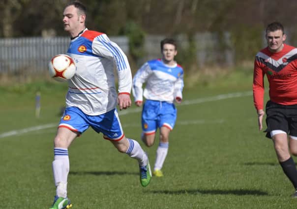 Lincoln Courts player John Wray controls the ball on his chest during Saturday's match against Drummond. INLS1214-150KM