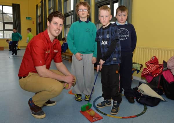 Enda Campbell from the Darren Clarke Foundation is pictured with Adam, Tommy and Owen at the cross community event with pupils from Carnalbanagh Primary School, Carnlough Integrated Primary School and hosted by Seaview Primary School, Glenarm. INLT 13-021-PSB