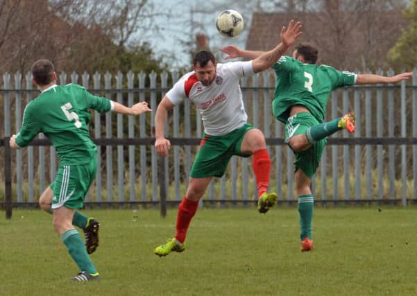 Sencer Yilmaz in action for Larne Tech OB in their game with Crumlin Star. INLT 13-047-PSB