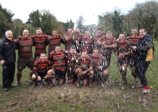 Ophir Rugby Club celebrate winning the Qualifying Four league title after Saturday's victory over Cavan.