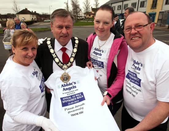 Mayor Fraser Agnew with Kerry Lockhart, her partner John Robinson and Deputy Mayor Dineen Walker (left) at the start of the 10-mile sponsored walk. INNT 13-066-FP  Pic by Freddie Parkinson