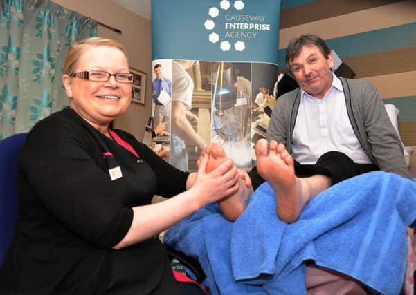 Beverley Ward from Coleraine gives business advisor Leo Mullan from the Causeway Enterprise Agency a reflexology massage to celebrate her taking her first steps back into employment as a self-employed reflexologist after completing the Exploring Enterprise² Programme (EE²P) through Causeway Enterprise Agency.

Credit: LiamMcArdle.com