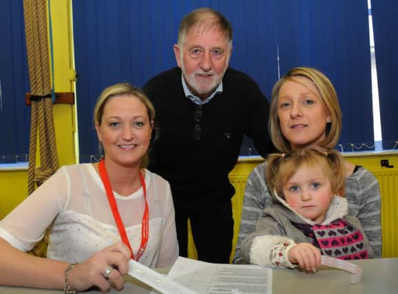 Charlie's grandfather Des Eastwood is pictured with Charlie's aunts Kelly Jo and Gilian and cousin Charlotte Rose, pictured at the bone marrow registration day at Holy Trinity College, Cookstown.