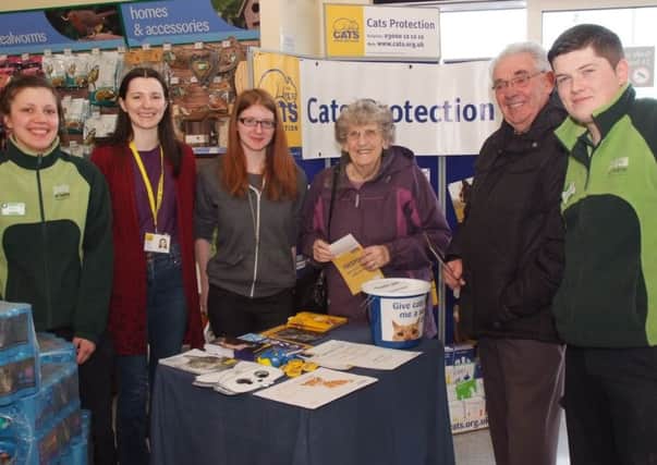 Pictured at the Cats Protection stand in Pets and Homes store are, from left, Sibylle Grasser, Pets at Home,  Katrina Killen, Branch Co-ordinator, Tasha Wilson, Joyce and Archie Orr, Mark Monahan, Pets at Home. incr13-205km
