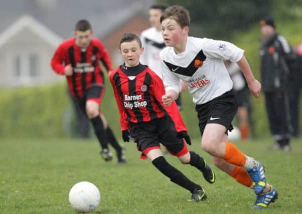 Youth soccer action from the under-14 game between Lisburn Youth and Willowbank. US1414-547cd Picture: Cliff Donaldson