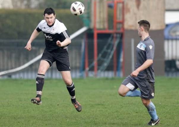 Action from Saturday's game between South Antrim and Clonduff. US1414-556cd Picture: Cliff Donaldson