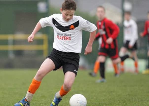 Youth soccer action from the under-14 game between Lisburn Youth and Willowbank. US1414-545cd Picture: Cliff Donaldson