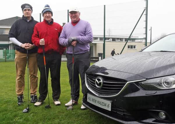 Peter McCann, Gerry McCann and Tommy Diamond taking part in the Walter Young Mazda sponsored competition at Ballymena Golf Club. INBT14-279AC