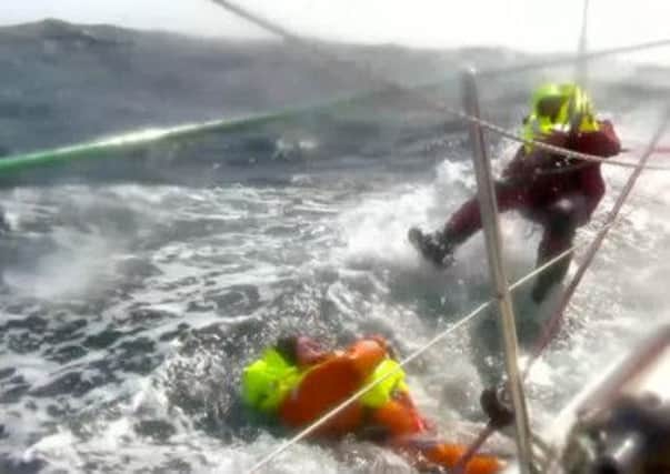 Londonderry crew member Andrew Taylor is recovered from the Pacific.