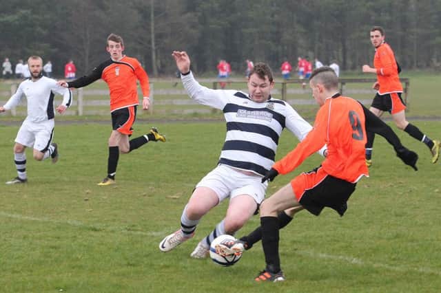Action from Ballyrashane's 5-1 win over FC Crusaders. PICTURE: Mark Jamieson