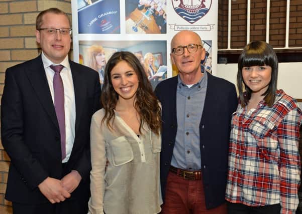 Larne Grammar School principal, Mr Wylie (left), is pictured with Lynsey Turner and Sian Blair, drama and show directors of the 2014 production of the Sound of Music, and Darwin Workman, who was director of the 1984 production of the show at the school. INLT 14-018-PSB