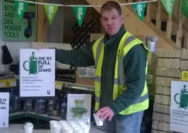 Serving up coffee during a fundraiser at JP Corry's outlet in Keeburn industrial estate.   INCT 14-748-CON
