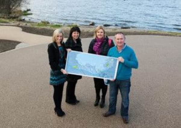 Pictured at the stunning Ardmore site with the plans for the Southern Shore regeneration are Councillor Carla Lockhart, Chair of the Development Committee, Patricia Lappin, Rural Development Officer, Sandra Durand, Tourism Development Manager and Councillor Declan McAlinden.