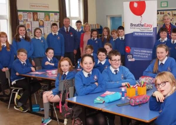 Pictured with Jackie Cochrane, Respiratory Nurse, Breathe Easy Causeway, are pupils of P7 Hezlett Primary School during ta talk. Included are Sam Kell,y Chairman of Breathe Easy Causeway and teacher Karen Gilpins. INCR14-325KM