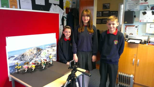Amy Louden, Lauren Laverty and Daniel Rollinson, P7 pupils at Landhead Primary School, who were part of the team which made the Giro d'Italia video. INBM15-14 UC