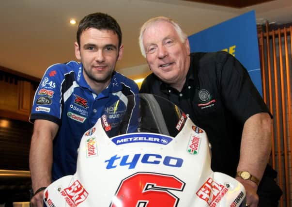 Michael Dunlop with Cookstown & District Motor Cycling Club treasurer and PRO Kenny Loughran during the press night to official launch the 2014 Cookstown 100 road races.INMM1514-323