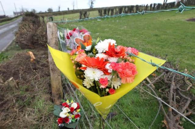 Tributes left at the scene of a fatal crash involving two vehicles on the Agivey Road outside Coleraine Co-Derry on Thursday morning.