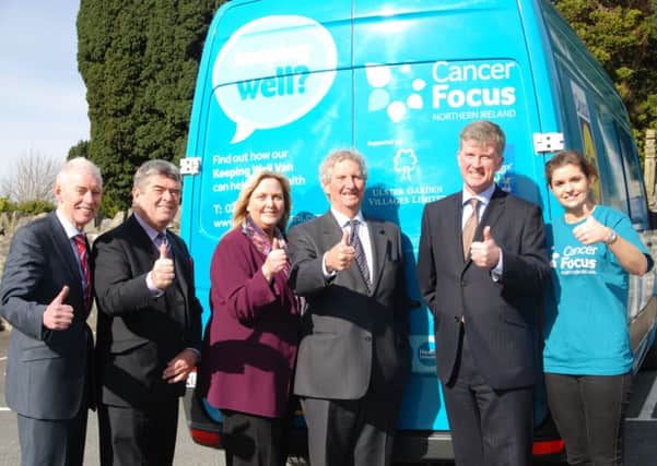 From left - Drew Crawford, Newtownabbey councillor Billy Webb, Valerie Ingram, Executive Director who is from Carrickfergus, Dr Tony Hopkins CBE, Chairman, and Kevin Baird, all Ulster Garden Villages, get a tour of the van from Maresa McGettigan, Cancer Focus Cancer Prevention Officer. INLT 15-634-CON