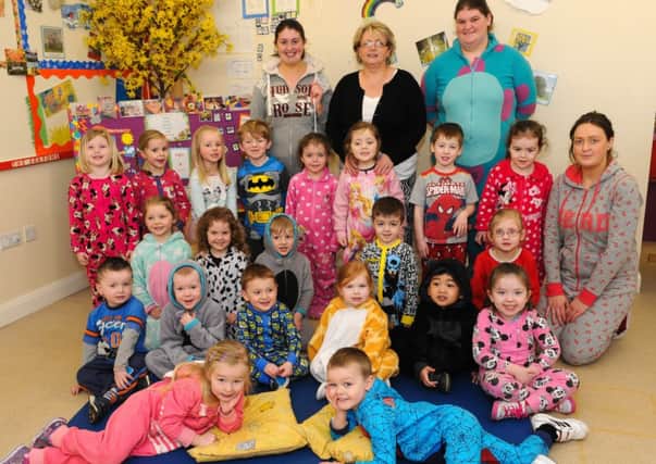 Pupils and staff from the Kiddies Castle Early Years, Castledawson, who joined in the fun of the World Autistic Society Onesie Wednesday raising awareness for Autism.