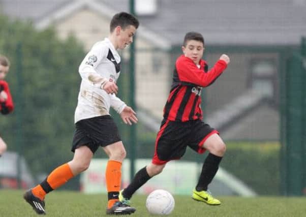 Youth soccer action from the under-14 game between Lisburn Youth and Willowbank. US1414-549cd Picture: Cliff Donaldson