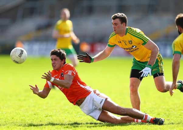 Armagh's Stephen Campbell with Donegal's Eamonn McGee during Sundays Allianz FL Division 2 game at the Athletic Grounds, Armagh.