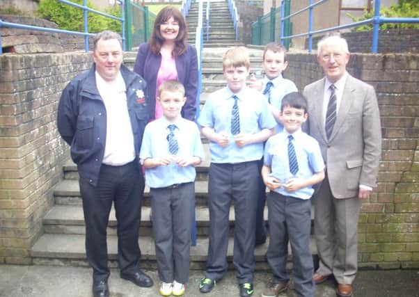 Pupils from St Annes Primary School who were winners of the Road Safety of NI Primary Schools Quiz.   Also in the photo is Albert Smallwoods, David Jackson Road Safety Committee and Siobhan Gillen, Vice-Principal. Pictured at the  pupils who were third in the event: Cormac McGinley, Pearse Brennan, Matthew McGurk and Daire McGonigle.