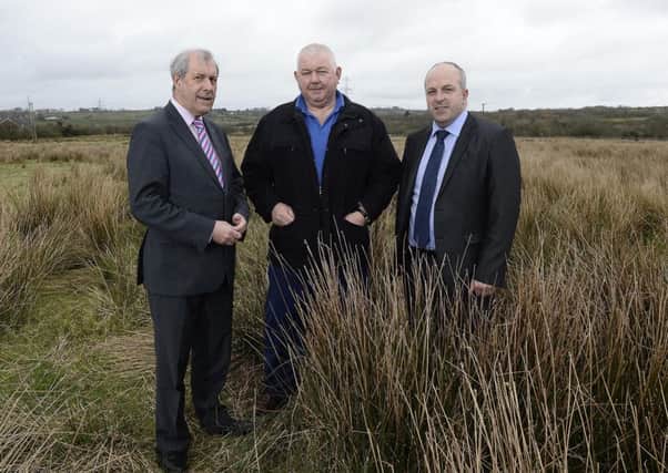 Chairman of Lisburn City Council's Planning Committee, Councillor Uel Mackin; Mr Gerard Magennis, Chairman of Stoneyford Community Association and Alderman James Tinsley, Vice Chairman of the Council's Planning Committee welcome planning approval for a new Integrated Constructed Wetland just outside Stoneyford Village.