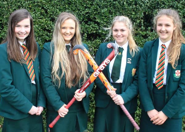 Captains of all Friends School Girls hockey teams who reached semi finals: Natasha Palmer (2B XI), Beth McClure (2nd XI), Jemma Walker (1st XI Plate Winners) and Rachel Barnes (U14A XI).