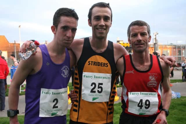 VICTORIOUS! - Scott Rankin (Foyle, 2nd), Glenn Phair (Annadale, 1st) and Declan Reed, (City of Derry, 3rd), pictured after Wednesday night's 5k. DER1514MC053