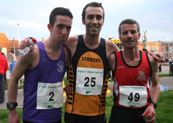 VICTORIOUS! - Scott Rankin (Foyle, 2nd), Glenn Phair (Annadale, 1st) and Declan Reed, (City of Derry, 3rd), pictured after Wednesday night's 5k. DER1514MC053