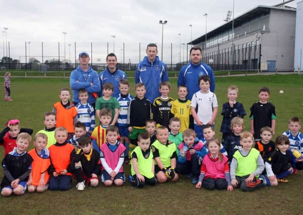 Junior members of Northend Youth pictured with coaches at a recent training session. INBT16-259AC